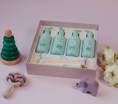 Love Momma’s 4 Bottles + Napkins Gift Hamper (Baby Shampoo, Hair Oil, Body Butter, Wash)